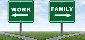 Work and family signs pointed in opposite directions